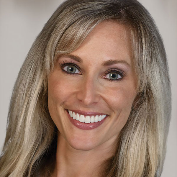 patient of Dr. Haddad shows off her cosmetic smile
