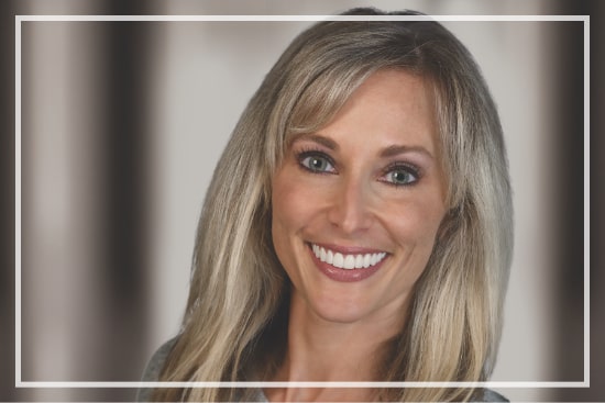 patient of Dr. Haddad showing off her cosmetic smile