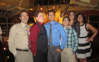 Patient Lauren and her family smiling