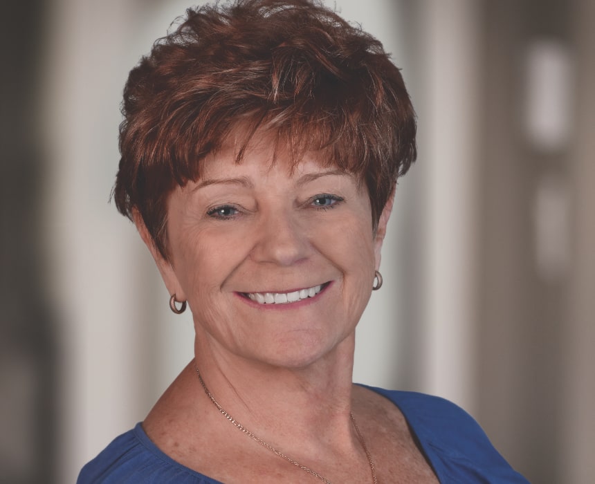 Non-SurgicalFacelift mature woman with short hair shows off her amazing smile