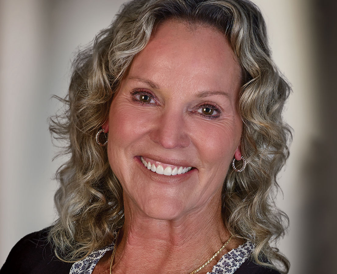 HaddadPatientLori female patient of Rochester Advanced Dentistry shows off her amazing smile