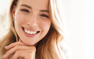 beautiful young woman showcasing her amazingly straight smile